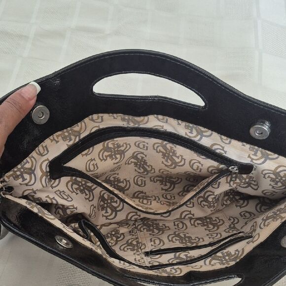 Guess Clutch Black Handbag with Silver Accents - Picture 9 of 16